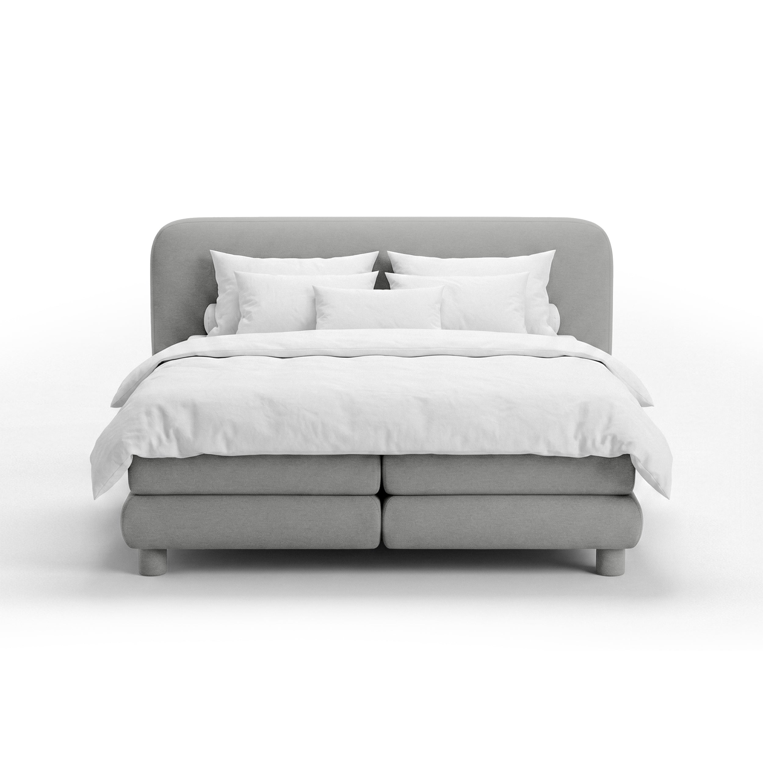 Continental bed with a rounded headboard in a modern organic style | Portela