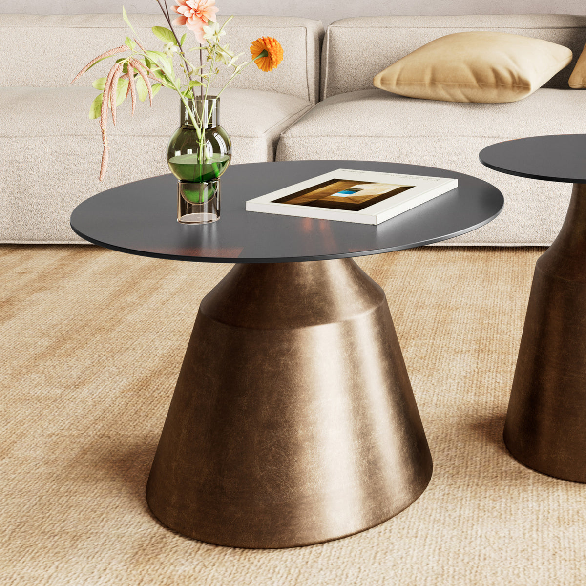 Fumor GOLD coffee table 70x42 in front of a light sofa, with a vase and a book – glass coffee table for the living room