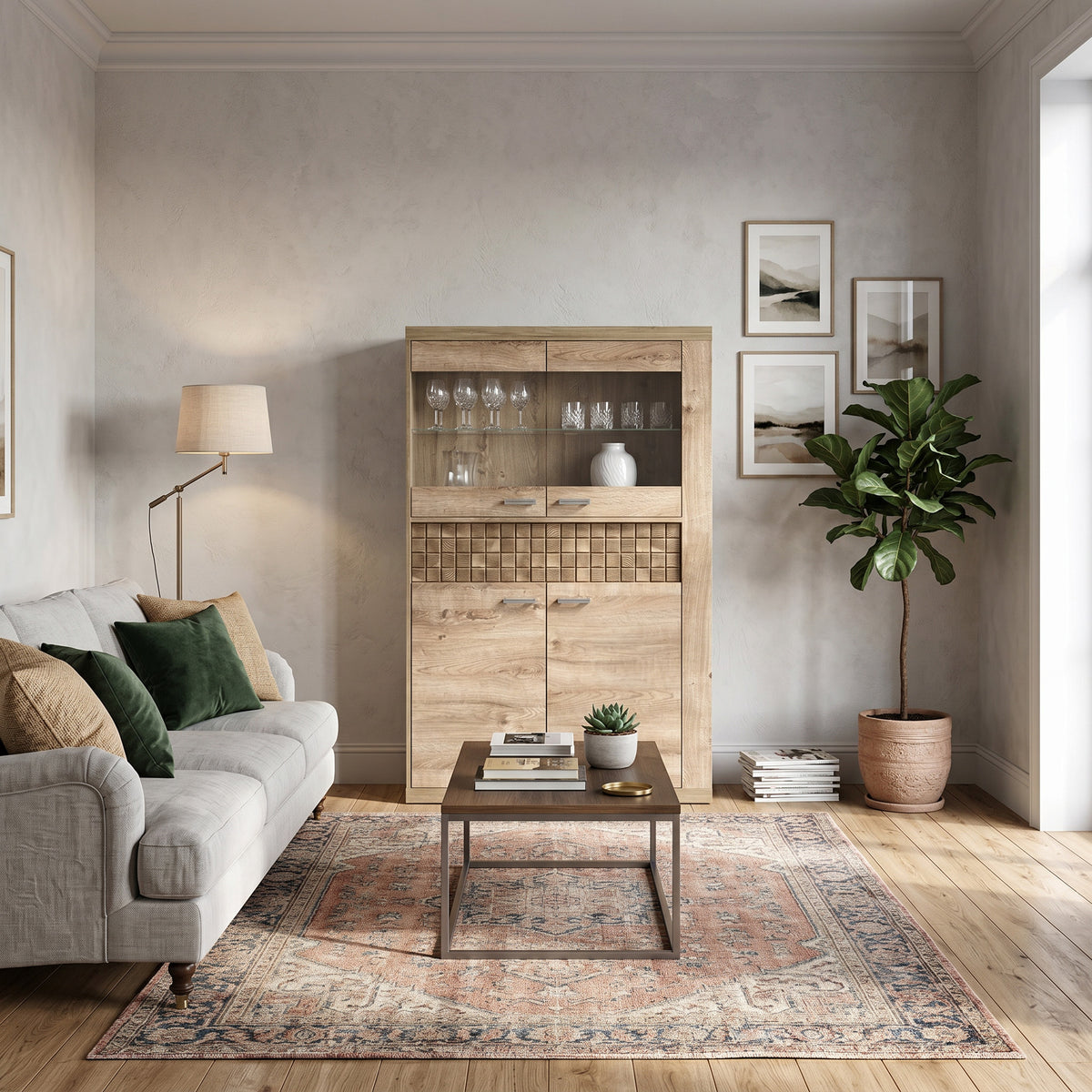 Korin display cabinet 102x160 in a living room with a grey sofa and a Persian-style rug – display cabinet for glasses