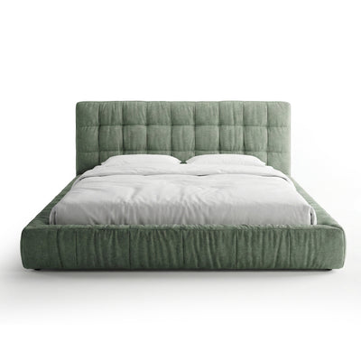 Quilted upholstered bed with a low frame in a modern style | Talaro