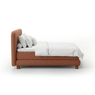Continental bed with a rounded headboard in a modern organic style | Portela