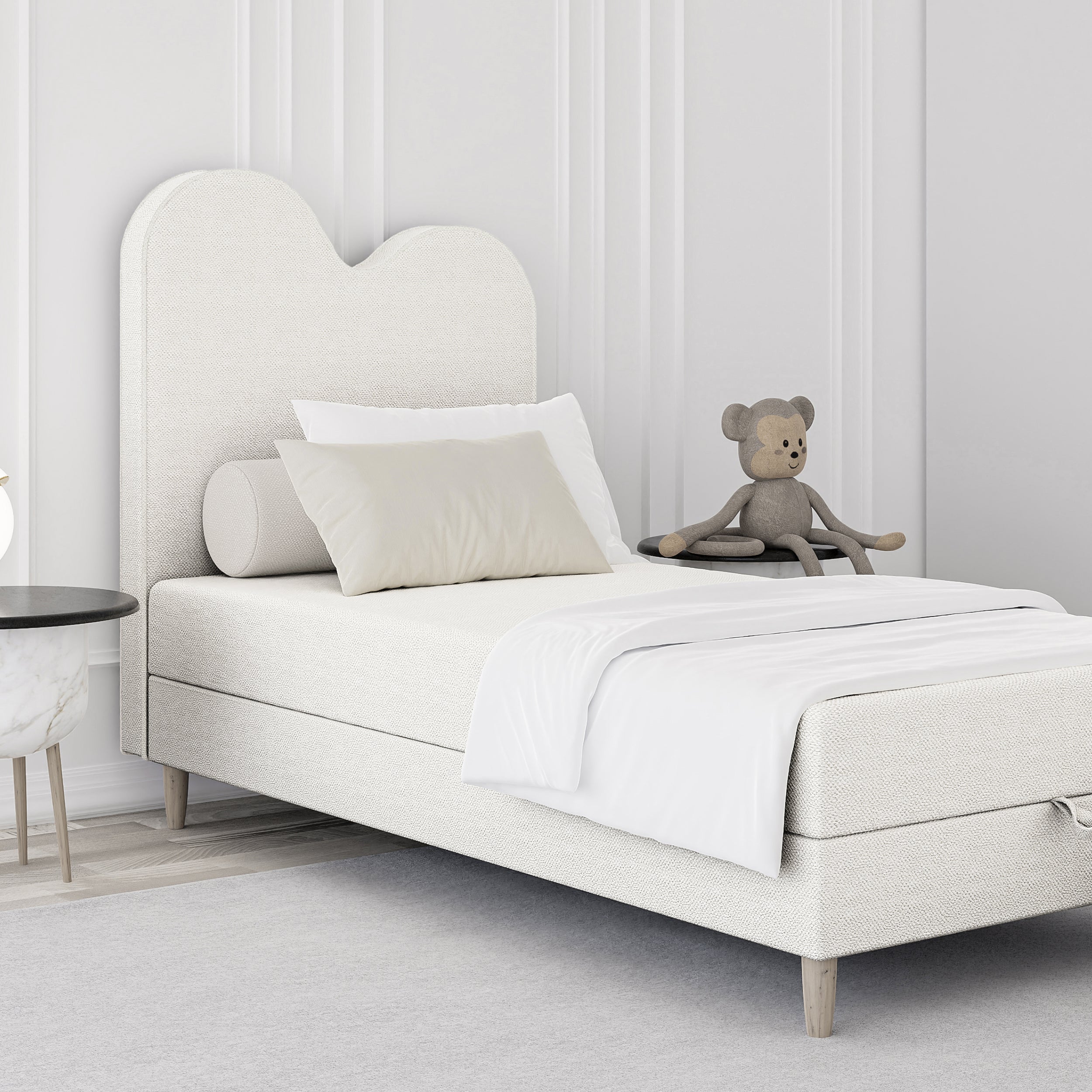 Kids continental bed with a wavy headboard and storage in a soft modern style | Mellia