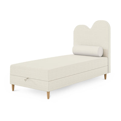 Kids continental bed with a wavy headboard and storage in a soft modern style | Mellia