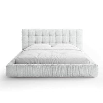 Quilted upholstered bed with a low frame in a modern style | Talaro