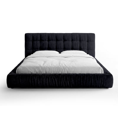 Quilted upholstered bed with a low frame in a modern style | Talaro