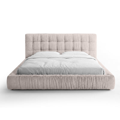 Quilted upholstered bed with a low frame in a modern style | Talaro