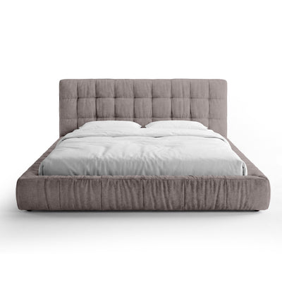 Quilted upholstered bed with a low frame in a modern style | Talaro
