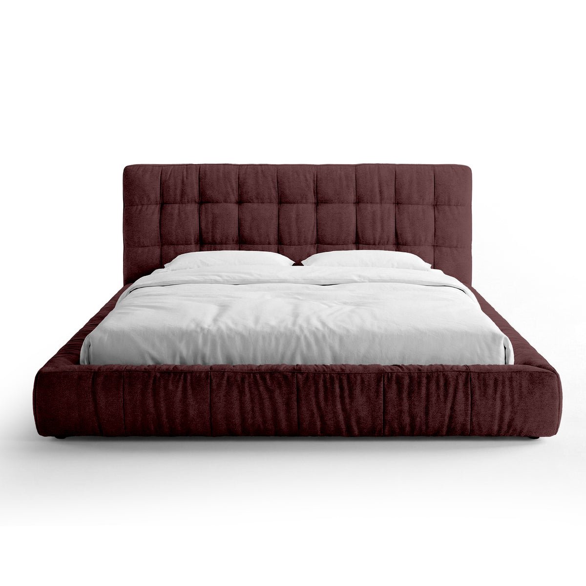 Quilted upholstered bed with a low frame in a modern style | Talaro