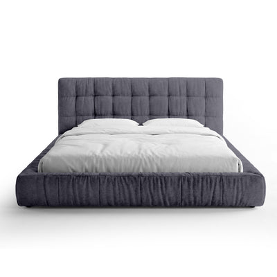 Quilted upholstered bed with a low frame in a modern style | Talaro