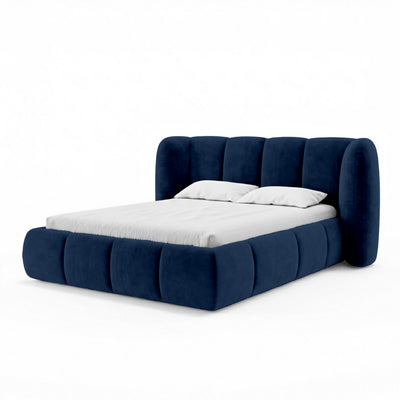 Upholstered bed with vertical tufting and storage in a soft modern style | Ventara