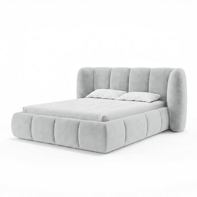 Upholstered bed with vertical tufting and storage in a soft modern style | Ventara
