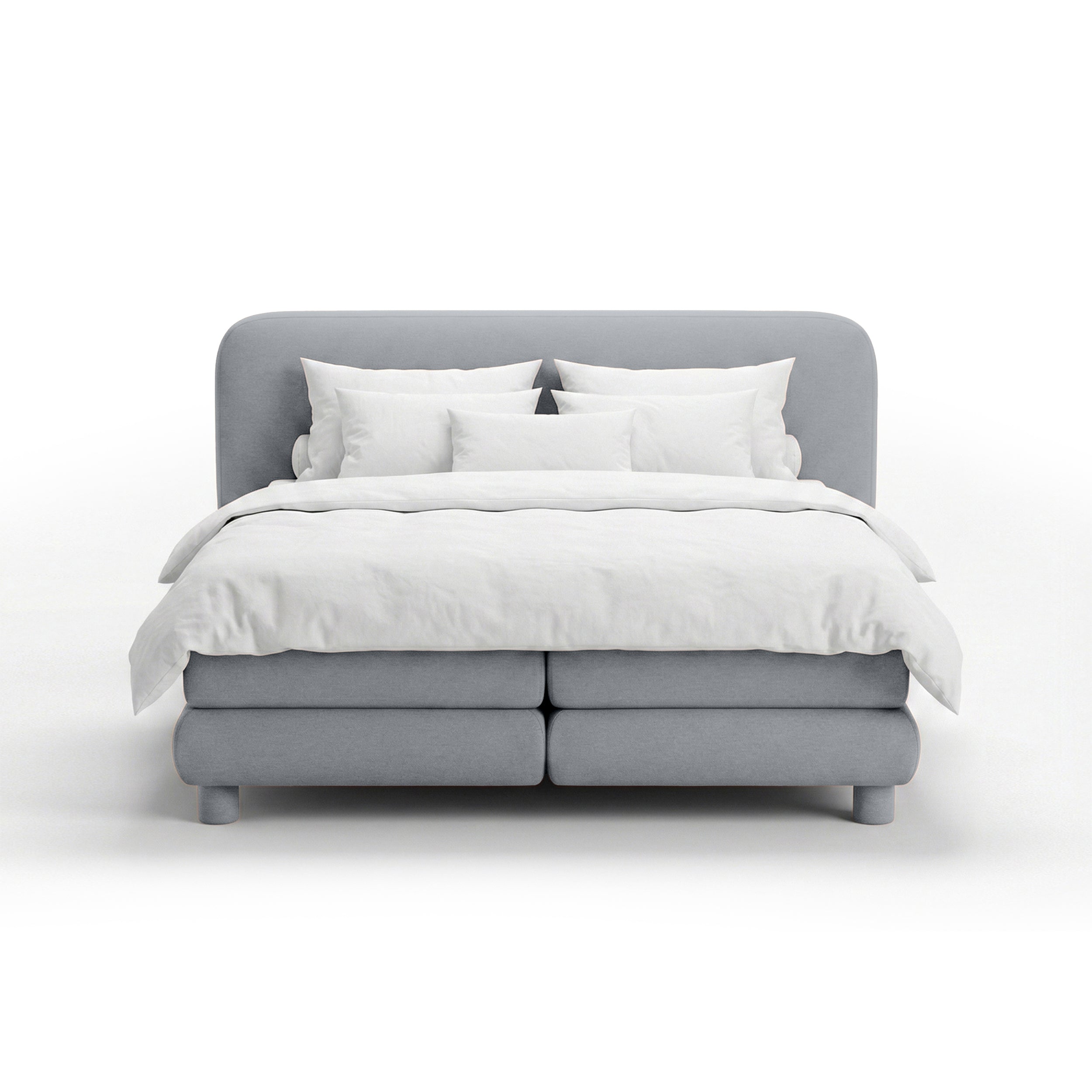 Continental bed with a rounded headboard in a modern organic style | Portela