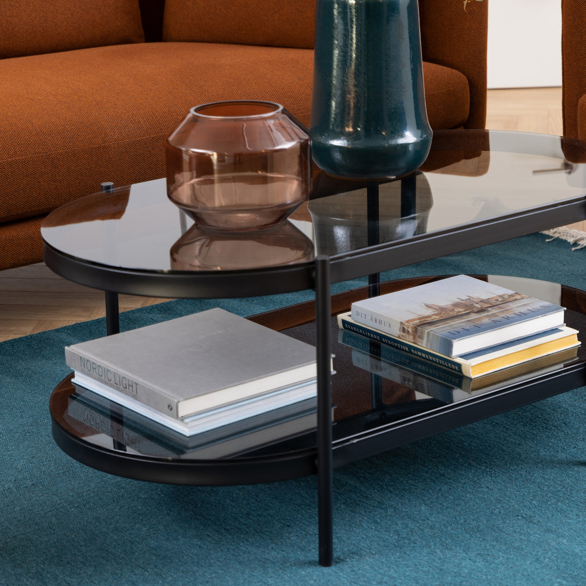 Stolik kawowy owalny z przydymionym szkłem w stylu nowoczesnym | Moren