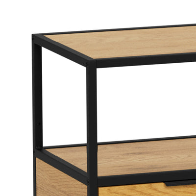 Skeleto low bookcase 114x78 Wild Oak – close-up of the corner where the steel frame meets the top in an oak finish