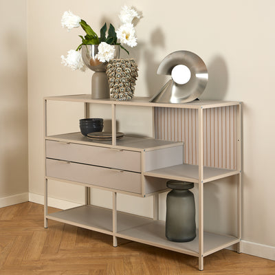 Skeleto low bookcase, 114x78, grey melamine, with white flowers in a vase and a silver lamp on the top