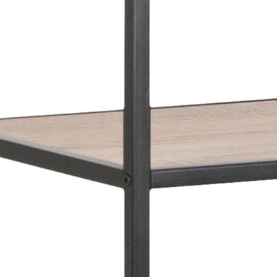 Skeleto bookcase 77x185 Sonoma Oak – detail of a shelf in an oak finish set within a black metal frame