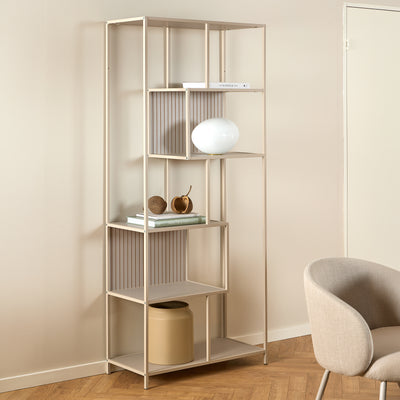 Skeleto bookcase, 77x185, grey melamine, in a bright room next to an armchair, with a spherical lamp – a bookcase for the living room