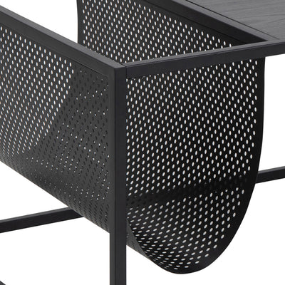 Skeleto 110x60 coffee table – a close-up of the perforated newspaper pocket and the square frame profile