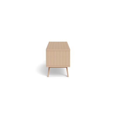 Lurisse TV cabinet 160x50, bleached oak – side view of the body and the slanted oak legs of the TV cabinet