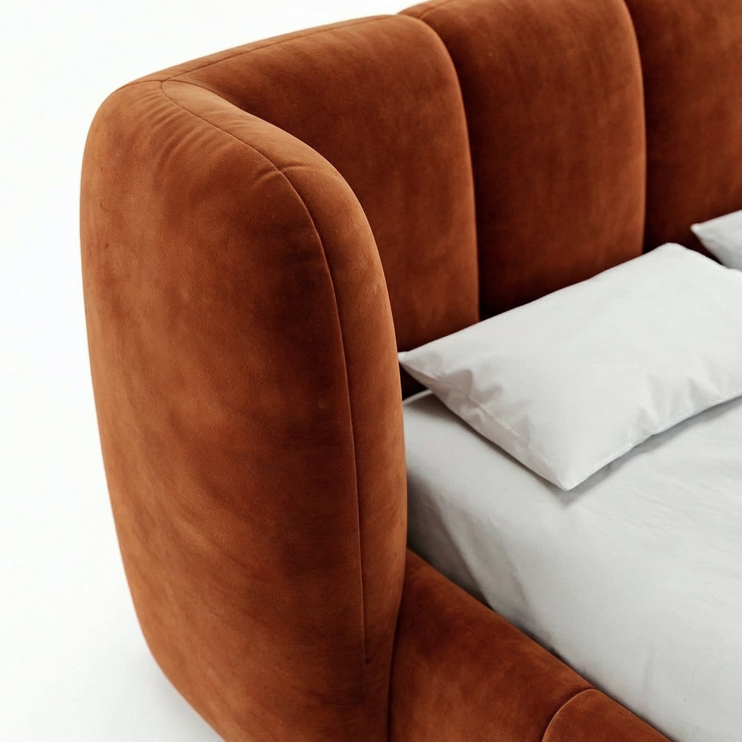 Upholstered bed with vertical tufting and storage in a soft modern style | Ventara